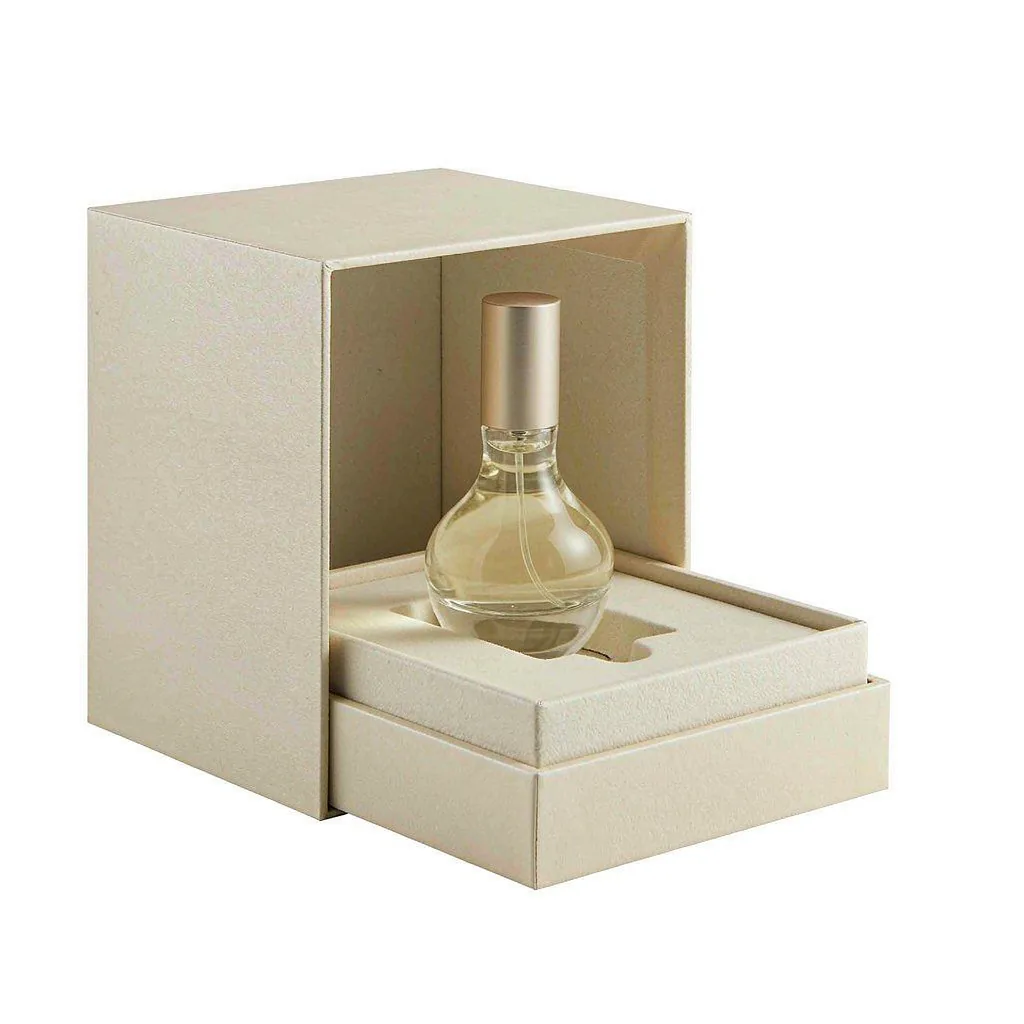 Luxury perfume rigid gift box with insert holding a glass fragrance bottle centred